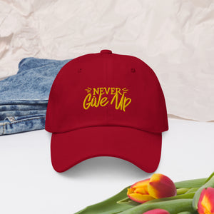 'Never Give Up' Gold Embroidered Dad Hat