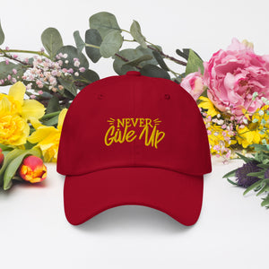 'Never Give Up' Gold Embroidered Dad Hat