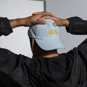 'Never Give Up' Gold Embroidered Dad Hat