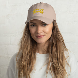 'Never Give Up' Gold Embroidered Dad Hat