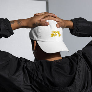 'Never Give Up' Gold Embroidered Dad Hat